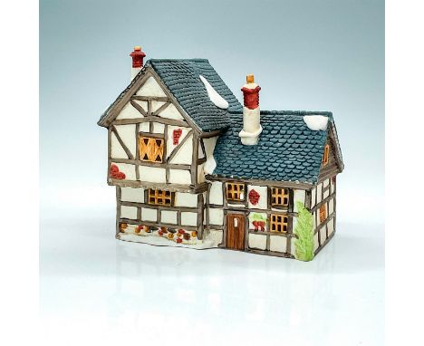 Part of the Dickens Village Series. Hand painted porcelain, depicting wattle and daub style cottage with light feature. This 