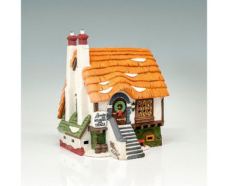 This figurine depicts a tiny village cottage during the winter holiday season. This item has its original box. Original box's