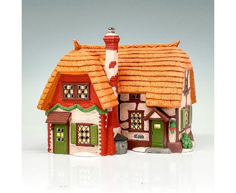 Part of the Dickens Village Series. Hand painted porcelain, depicting quaint thatched roof cottage. This item has its origina