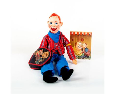 Black with red piping bag, riveted handle, and Howdy Doody patch attached to front. Writing pad depicts Howdy Doody with Clar