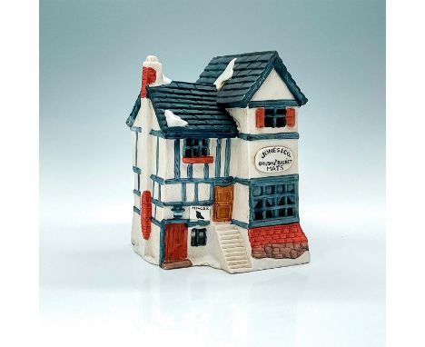 Part of the Dickens Village Series. Porcelain, depicting quaint basket shop with light feature. This item has its original bo