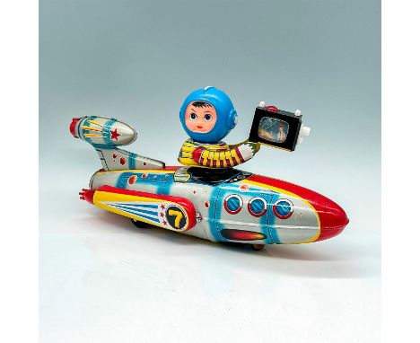 A clean tin-litho toy with rubber headed astronaut. All original with Astronaut Driver with TV Camera. This item has its orig