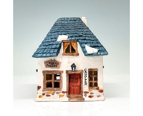 Part of the Dickens' Village Series. Hand-painted porcelain figure modeled as a small cottage with ""Rooms for Let"" and ""Ca