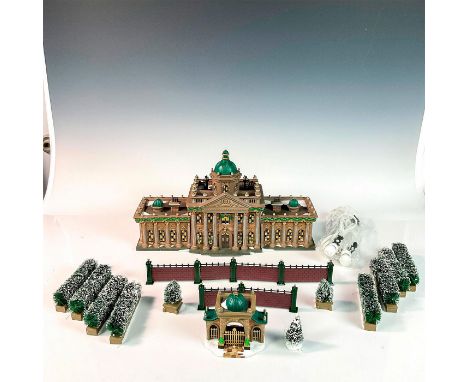 This depicts a great palace that is colored in browns and green. It includes some shrubbery and fences for the palace as well
