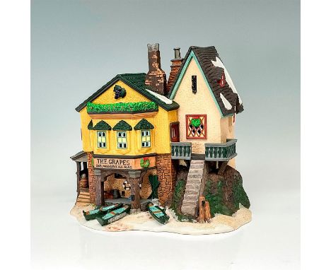 Part of the Dickens' Village Series. Fifth edition limited to 1996. Hand-painted porcelain figure modeled as a Christmas deco