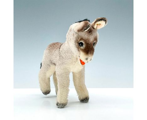 Dralon plush burro with painted realistic details, ears forward, and orange mouth. Ear button with Steiff mark. Issued: c. 19