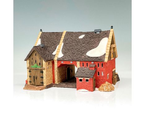 Part of the Dickens' Village Series. Hand-painted porcelain figure modeled as a Victorian style storefront. Light switch cord