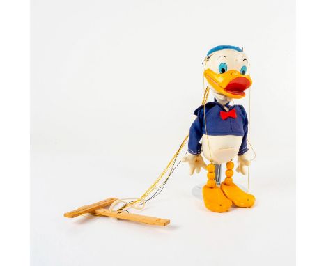 Hand-painted and decorated wooden puppet from famous UK puppet maker Pelham. Issued: c. 1960Dimensions: 4.5""L x 4.5""W x 9""
