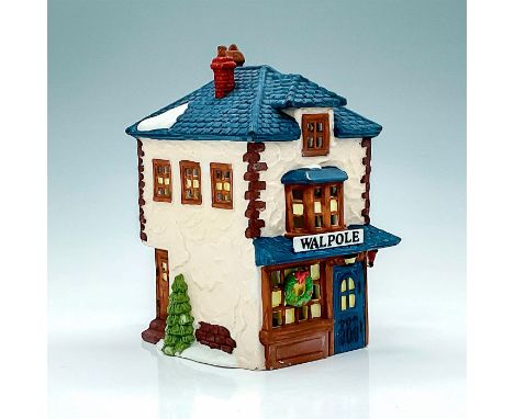 Part of the Dickens Village Series. Porcelain, depicting tailor's shop with light feature. This item has its original box wit
