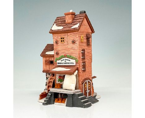 This figure depicts an old fashioned mill made out of wood with multiple stories. This item has its original box. The box's d