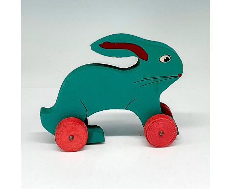 Wooden hand painted bunny cut out with wheels. This figure often used for advertising purposes, this item is unbranded. Issue
