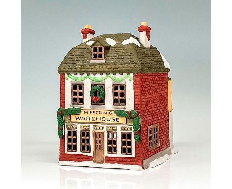 This figure depicts a square cottage warehouse made of red brick and wood. The warehouse is decorated for the holiday season.