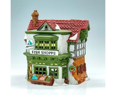 Part of the Dickens Village Series. Hand painted porcelain, depicting quaint fish shop with light feature. This item has its 