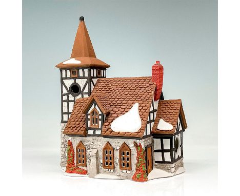 Part of the Dickens' Village Series. Hand-painted porcelain figure modeled as a Victorian style church. Department 56 backsta