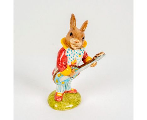 Depicts a well-dressed bunny strumming on their blue and yellow floral guitar. Royal Doulton backstamp. Dimensions: 3""L x 1.