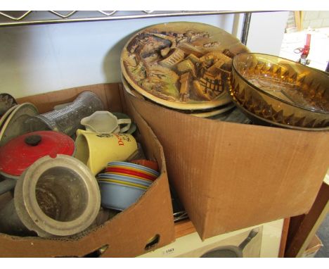 Two boxes containing a quantity of enamel ware, kitchenalia and chargers etc.