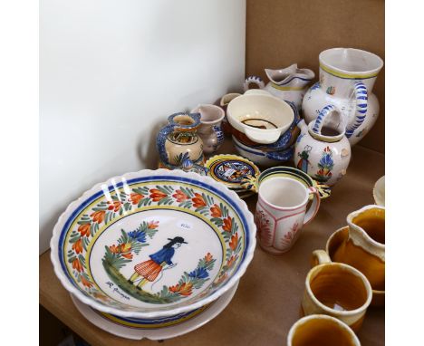 A collection of quimper jugs and bowls, tallest 20cm 