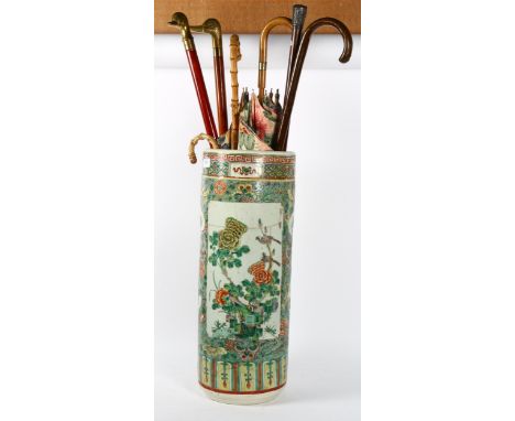 A Chinese famille verte ceramic stick stand (A/F), an Indian unmarked silver-topped walking cane, walking sticks etc, stand h