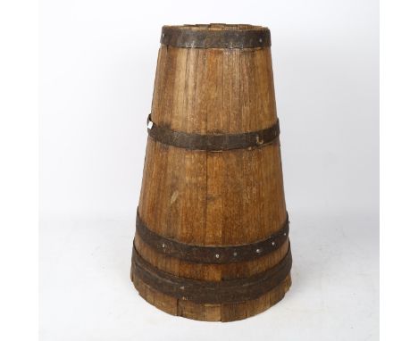 A tapered coopered oak stick stand, height 50cm 