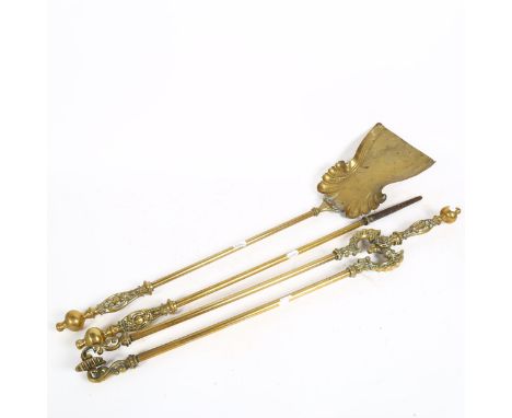 A 19th century set of brass fireside tools (3) 