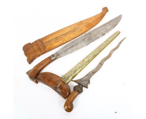 A Middle Eastern Kris dagger and scabbard, and another Middle Eastern sword (2) 