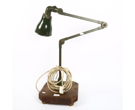 A Vintage industrial green anglepoise bench lamp, with white enamel shade 