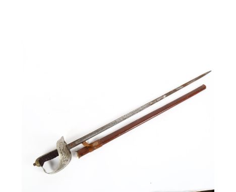 A George VI Officer's Cavalry sword, with shagreen grip, engraved blade and leather-covered scabbard, blade length 83cm 