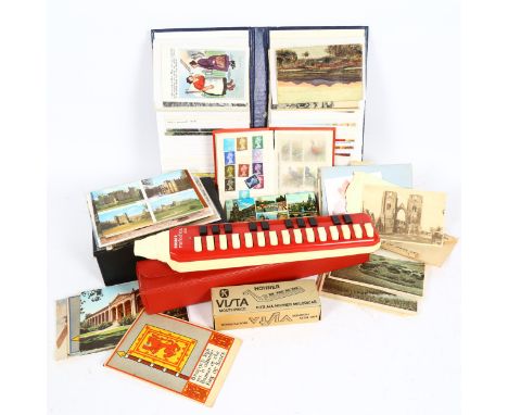 Postage stamps, postcards, and a Hohner Melodica-Alto harmonica 