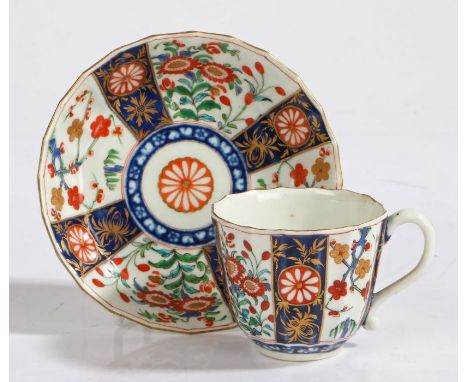 A Worcester Queens Pattern cup and saucer, circa 1770, with hatched square mark in blue to the base of the cup and saucer