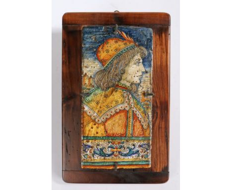 A maiolica architectural tile or panels, the rectangular tile painted with profile portrait of a nobleman, 15cm x 30cm, mount