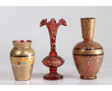 Three 19th Century bohemia glass vases, to include example with frilled neck, all with gilt scroll and enamel decoration, two