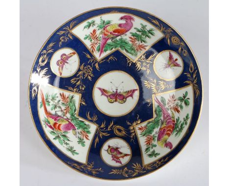First period Worcester dish, the blue and gilt stylised foliate ground with fan shaped panels decorated with exotic birds int