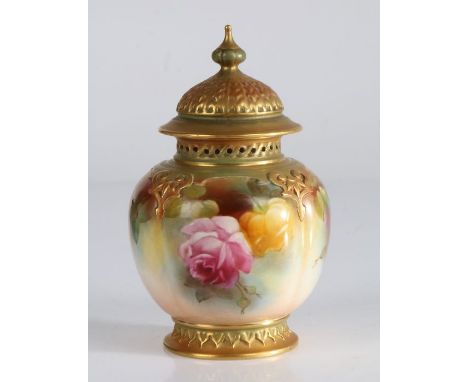 Royal Worcester vase and cover, the moulded domed lid with gadrooned finial, the pierced rim above a moulded and scroll decor