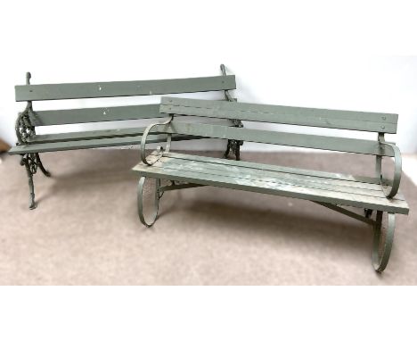 A vintage cast iron and painted garden bench, with pierced sides and slatted seats and another bench (2)
