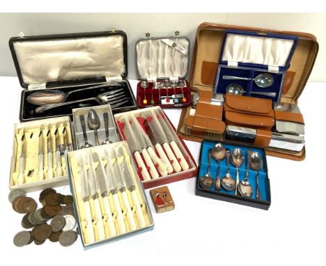 An assortment of cased flatware, also a vanity case and a small group of mixed coins (a lot)