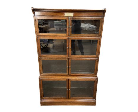 An oak cased Globe Wernicke type four section bookcase