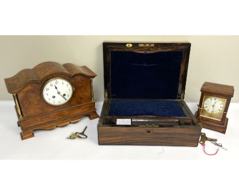 A Victorian coromandel writing box; also a 19th century rosewood cased mantel clock and another vintage clock (3)