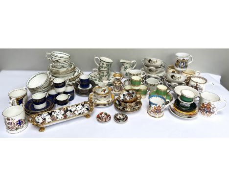 A mixed lot of ceramics, including various tea wares, decorated with playing cards, also a small group of commemorative mugs 
