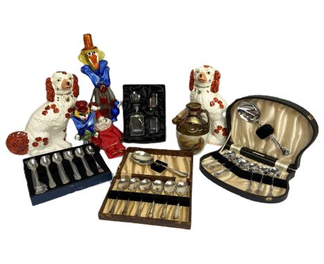 A miscellany of items, including a Burn's Crystal decanter set, silver plated flatware, a Rutherford's whisky decanter, and t