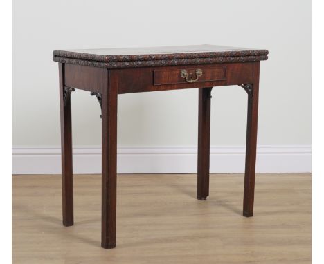 A GEORGE II RECTANGILAR MAHOGANY FOLDOVER CARD TABLEWith a single drawer frieze, 84cm wide; 95cm high; 76cm deep