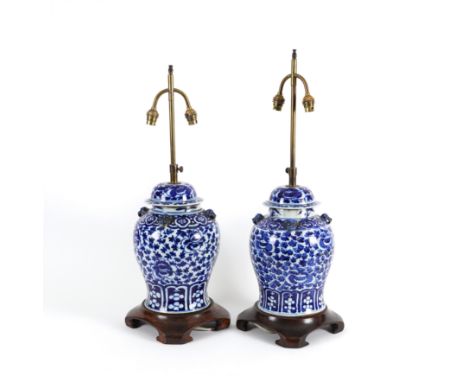 A PAIR OF CHINESE BLUE AND WHITE CERAMIC BALUSTER ‘GINGER JAR’ TABLE LAMPS (2)Modern Of baluster form with dogs of foo masks,