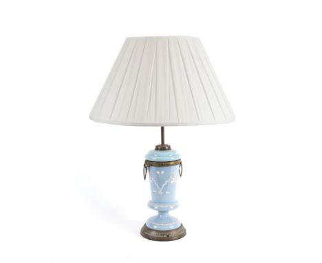 A FRENCH GILT-METAL MOUNTED PALE BLUE AND WHITE ENAMEL DECORATED CERAMIC TABLE LAMPLate 19th / Early 20th Century  Later conv