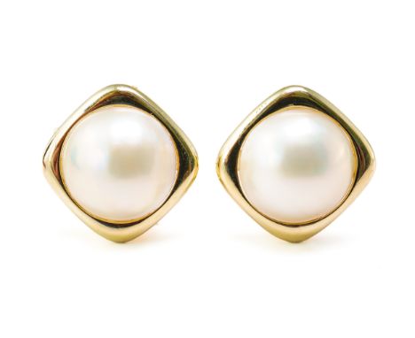 A PAIR OF GOLD AND MABE PEARL EARCLIPS (2)Each mabe pearl in a curved square surround, with clip and post fittings, detailed 