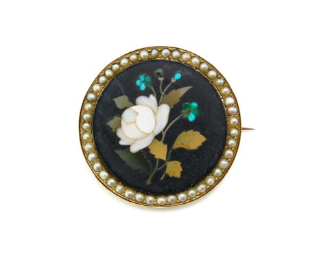 A GOLD, PIETRA DURA AND HALF PEARL CIRCULAR BROOCHThe central floral spray mounted with a surround of half pearls, diameter 3
