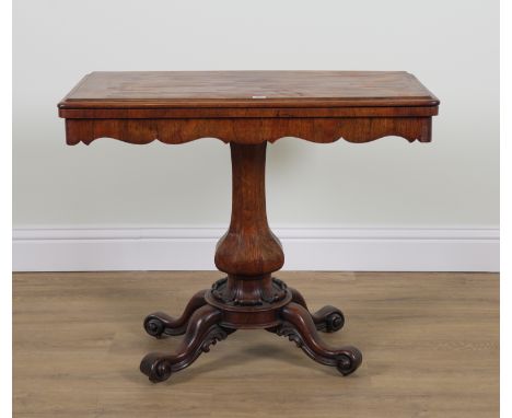 A VICTORIAN ROSEWOOD FOLDOVER CARD TABLE92cm wide; 45cm deep; 74cm high