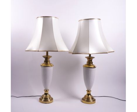 A PAIR OF WHITE GLAZED CERAMIC AND BRASS MOUNTED URN SHAPED TABLE LAMPS (2)Modern  With fluted tapering bodies, 60cm high exc