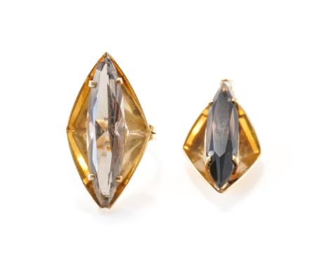 A 9CT GOLD AND SMOKY QUARTZ RING AND A 9CT GOLD AND SMOKY QUARTZ PENDANT (2)Both mounted with a marquise cut smoky quartz in 