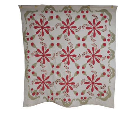 TWO POSSIBLY AMERICAN QUILTS WITH STYLISED RED FLORAL AND GREEN LEAF DESIGN (2)Early 20th Century and Later  The first with c