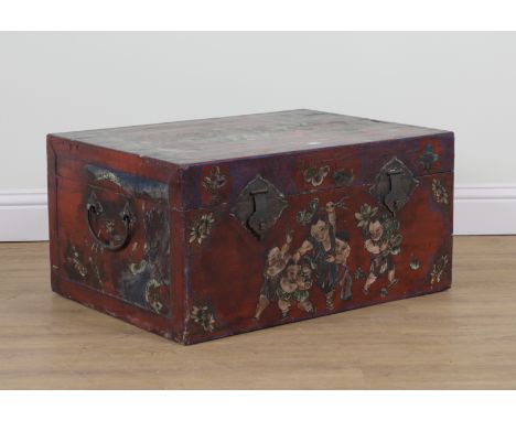 AN EARLY 20TH CENTURY JAPANESE RED LACQUER DECORATED TRUNK84cm wide; 62cm deep; 42cm high