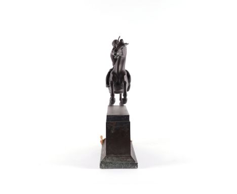 AN ART DECO PATINATED BRONZE SCULPTURE OF DIANA THE HUNTRESSEarly 20th Century Modelled on horseback, upon a plinth and verde